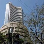 Indian shares open higher amid earnings rush