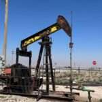 Crude trades flat over hopes of no spillover